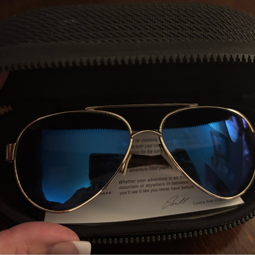 Costa Gold Frame Sunglasses with Blue Lenses